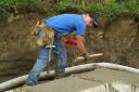 John levelling the concrete