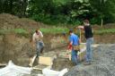 Michel shovelling the concrete