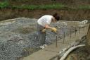 Linda placing the dowels