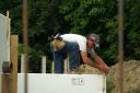 Richard placing stringline along the walls