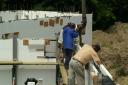 Richard, John and Rene pumping the concrete